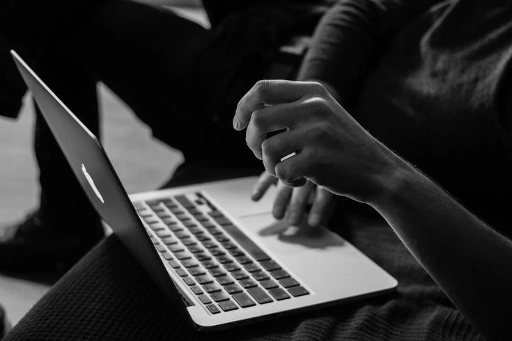 Modern laptop and digital marketing strategist in thrissur at home office